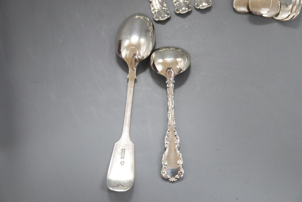 A set of six George V silver fiddle pattern dessert spoons, Sheffield, 1913, four sterling small ladles and 3 other spoons.